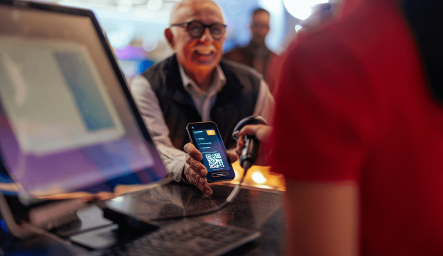 Man scanning a digital ticket at an event